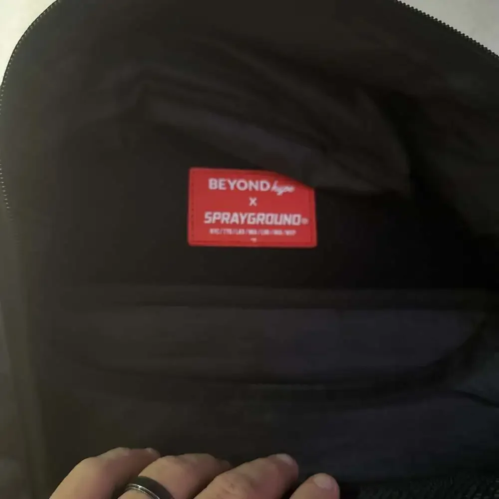 Sprayground Black Camo Shark Mouth Backpack